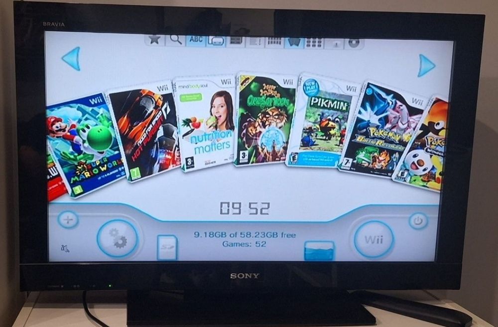 Nintendo Wii com 52 jogos digitais.