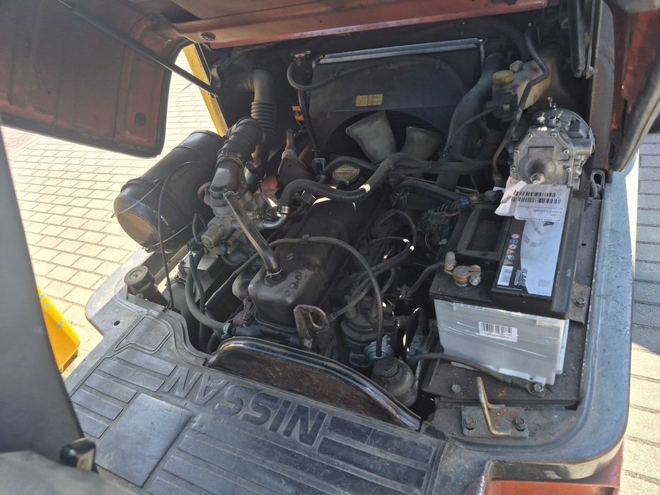 Wózek widłowy Nissan UD02A25PQ  2003 rok