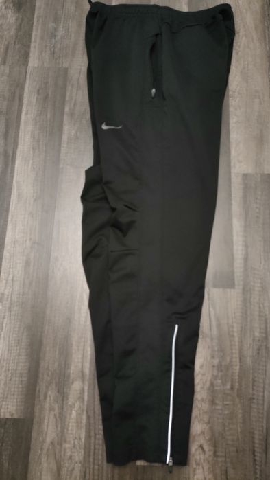 dresowe , sportowe, grubsze spodnie NIKE dri -fit z zamkami