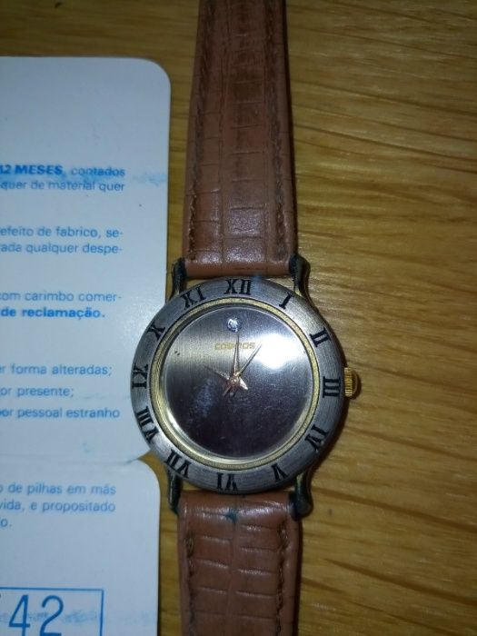 Relógio antigo da marca Cosmos