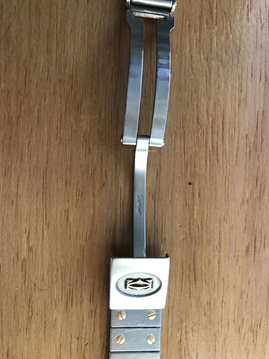 elos bracelete relogio cartier santos (aco e ouro)