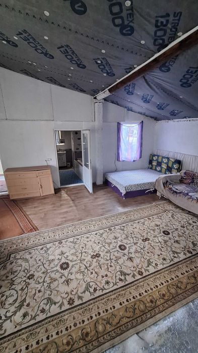 Продам дом в центре поселка Великодолинское.