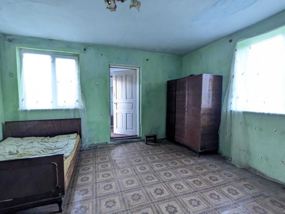 Продається  1 кімнатний  будинок і 14 сотих землі,село Задністрянське.