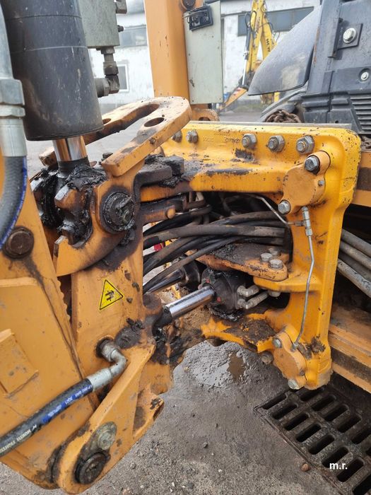 Case 695 ST Koparko ładowarka