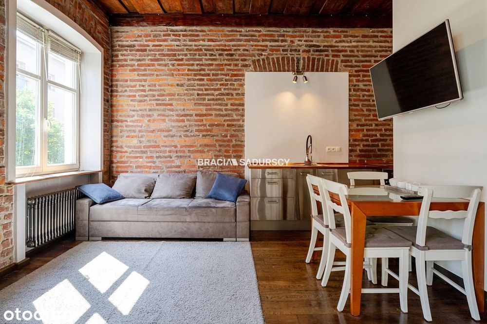 Dwupokojowy apartament z historycznym charakterem
