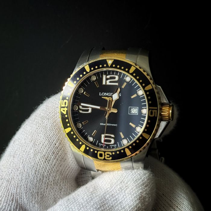 Longines Hydroconquest 39mm. Męski zegarek, Szwajcar, bicolor. Zloto i czerń, bransoleta. Gwarancja autentyczności.