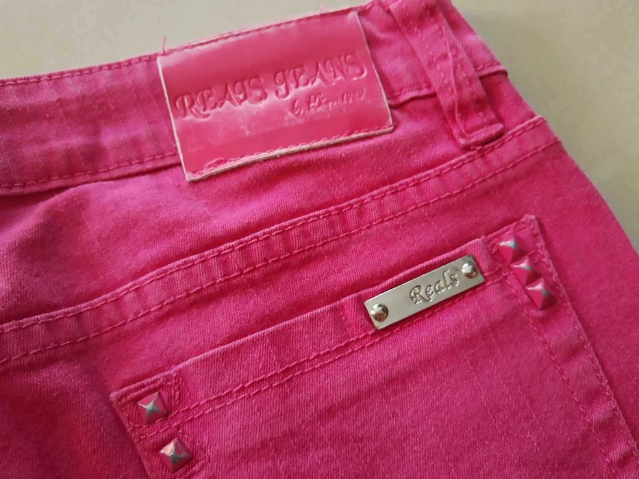 Różowe dżinsy spodnie damskie dopasowane biodrówki rurki L Reals Jeans