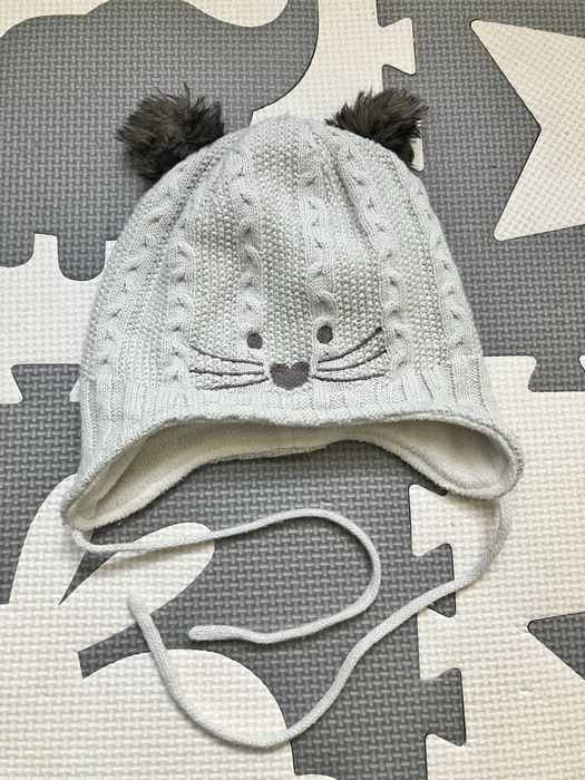 Czapka zimowa z wiązaniem Coccodrillo rozmiar 44 kotek z pomponami