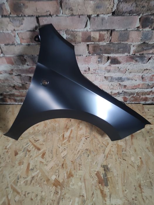 Крило переднє праве шкода рапід