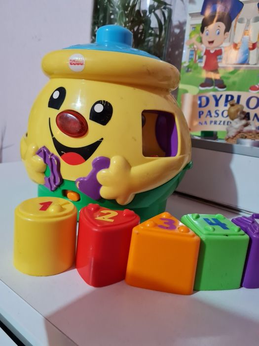 Fisher price garnuszek na klocuszek