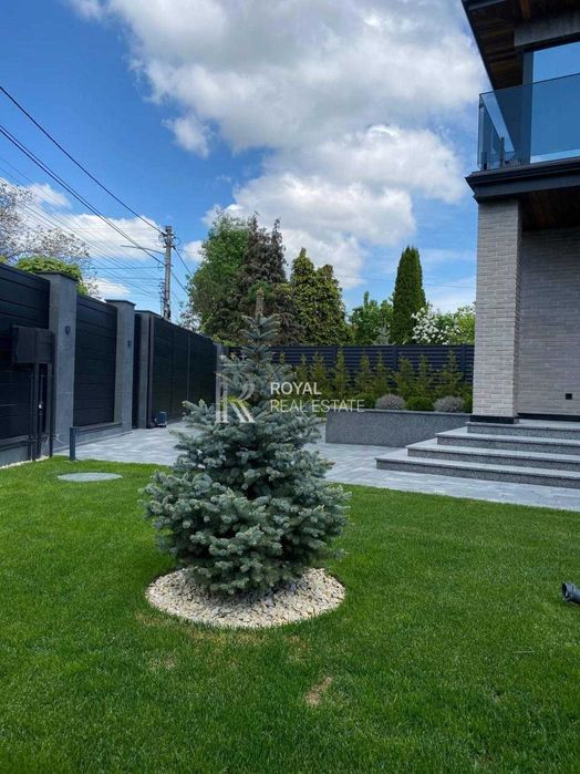 Продаж Будинок Київ Голосіївський район вул. Малокитаївська 300 м² 4 спальні Ділянка 5 соток Газ Гараж Підвал 20 кВт Під чистове оздоблення