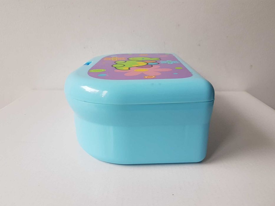 Niebieska plastikowa śniadaniówka lunchbox z zielonym dinozaurem