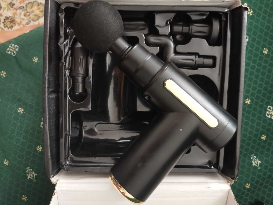 Massagador novo com acessórios