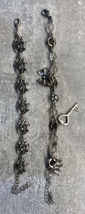 Zestaw biżuterii bransoletki pierścionki zegarki wisiorki