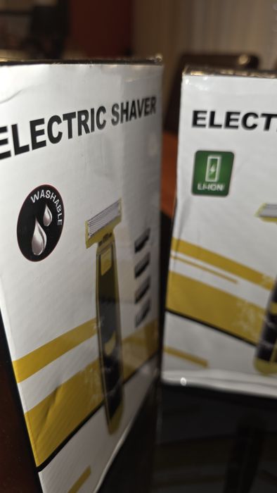 Máquina de barbear e cortar pelos ou cabelo