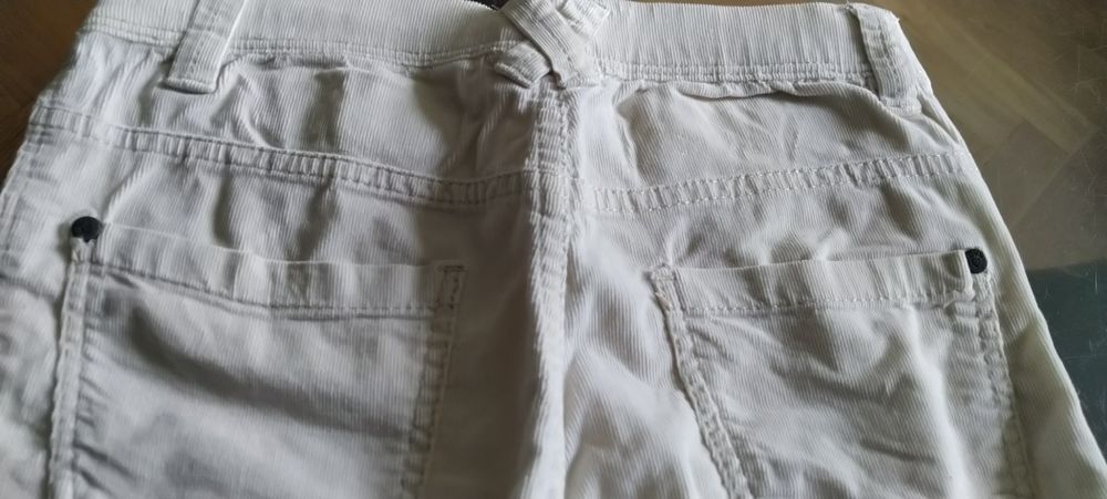 Штани на дівчинку бренду OVS.