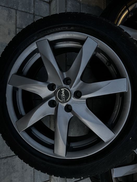 Felgi alu + opony zimowe Nokian 215/50 R17