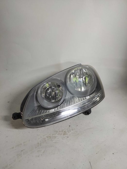 Vw Golf V,OE:1K694.1005C, Lampa przednia lewa, Oryginał HELLA, Europa