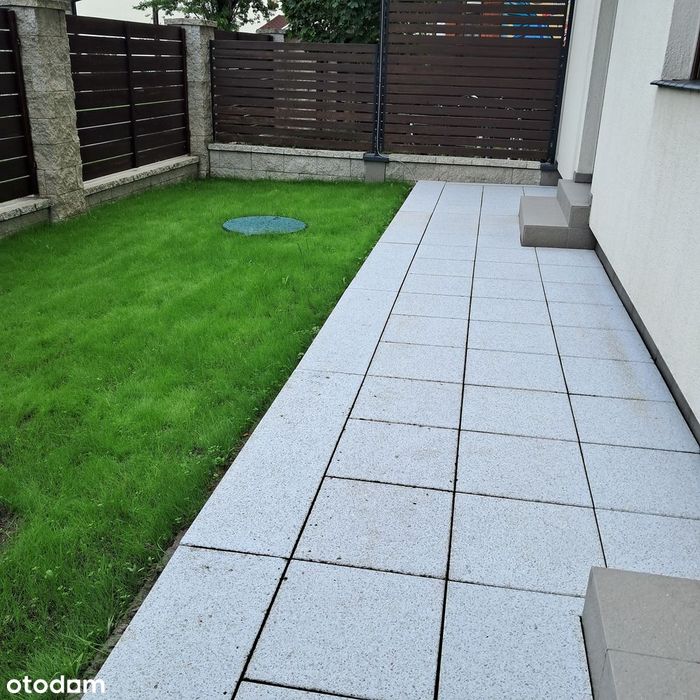 Nowoczesne mieszkanie z ogródkiem w apartamentowcu w Toruniu