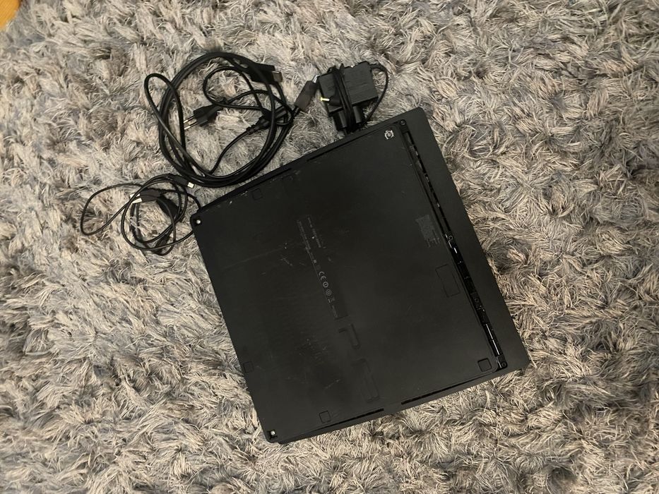 Playstation 3 + 17 gier + pady + alcesoria (Move/Skylanders/Singstar)