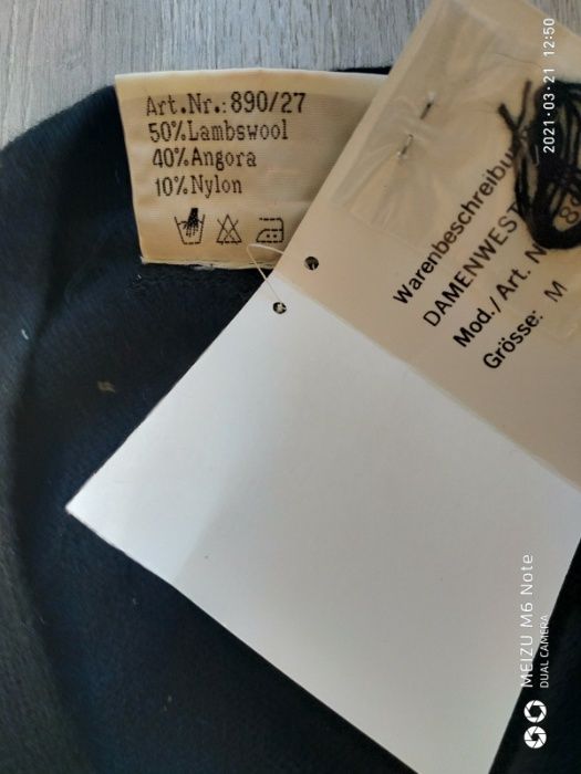 женская теплая кофта (новая)50%lambswool,40%-angora,10 nylon.