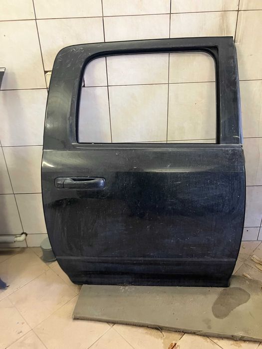 Drzwi tylne prawe DODGE RAM 1500 IV DS w kolor bez malowania 09-19