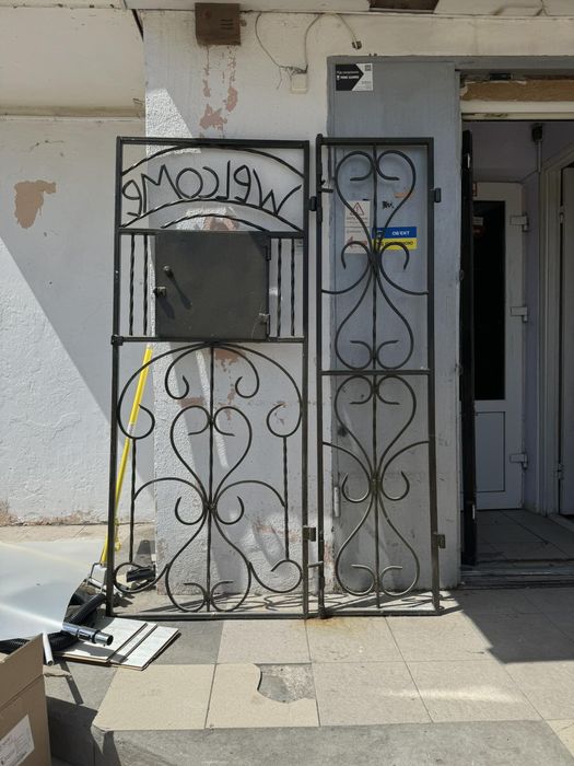 Металлическая решетка - двери