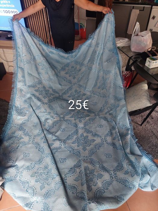 Carpetes / mantas / edredões