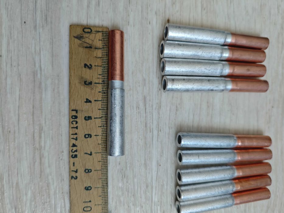 Гільза для з'єднання мідного і алюмінієвого проводів м16 і м10