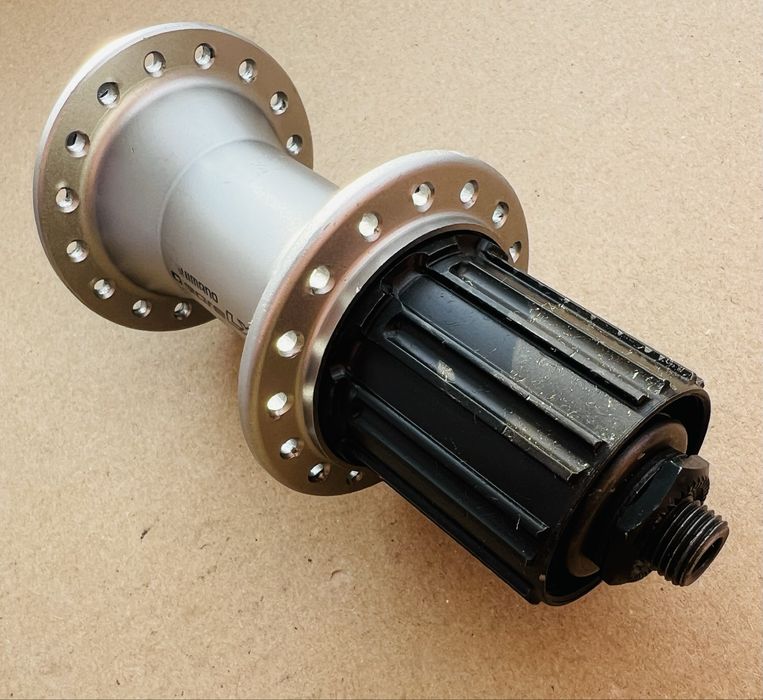 Piasta Tylna SHIMANO DEORE LX FH-M580 32 Szprychy Kaseta 8/9/10s 9x135