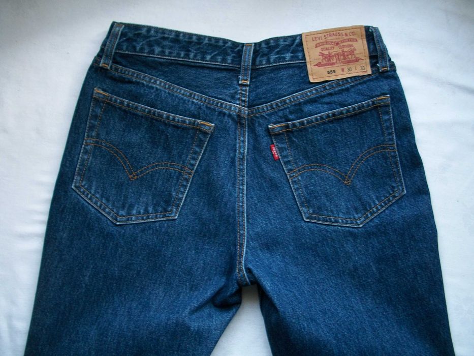 винтажные расклешенные женские джинсы Levis 559 полут.37-38 см