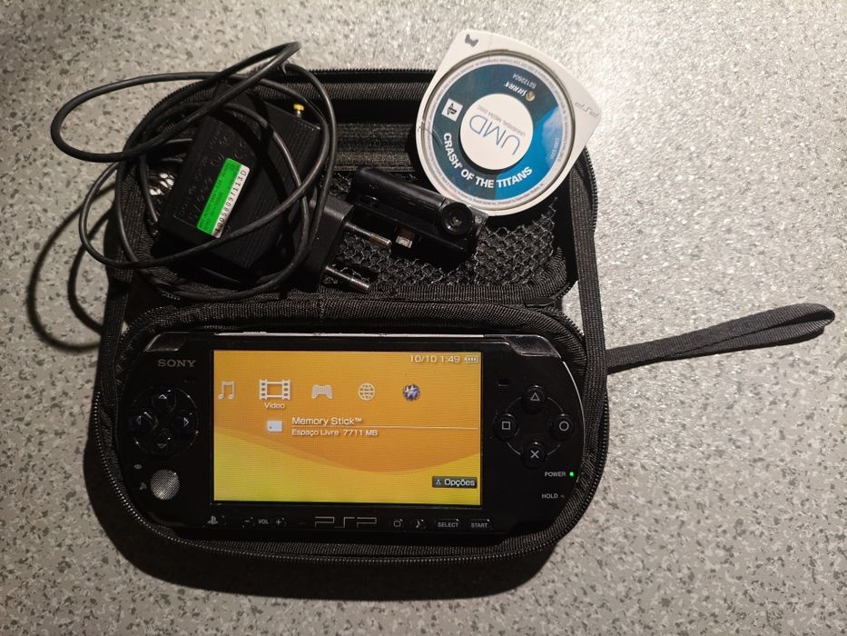PSP + Camara + jogo + bolsa de transporte