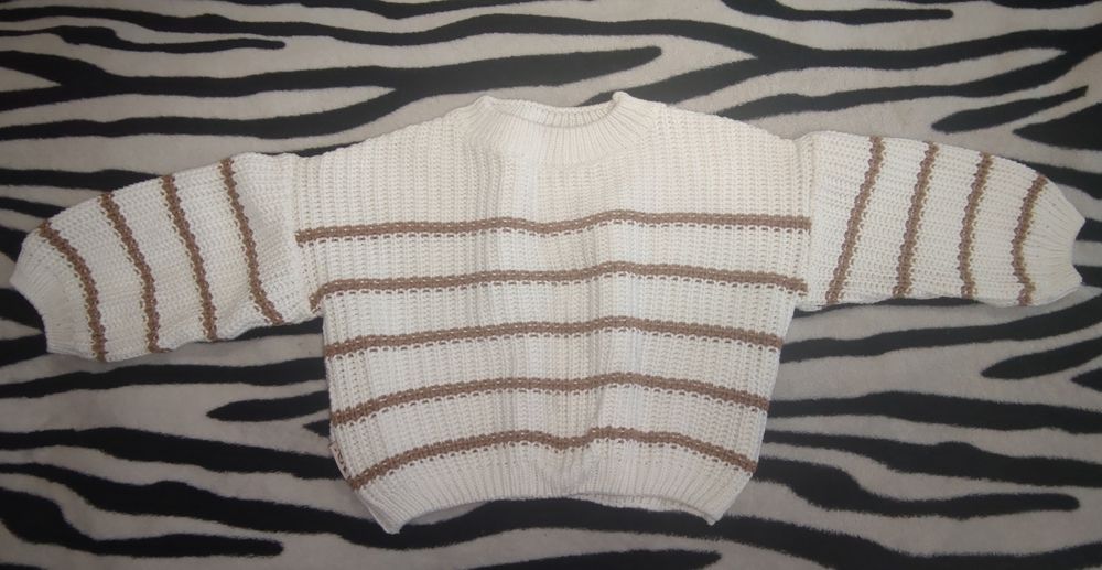 В'язана кофтинка