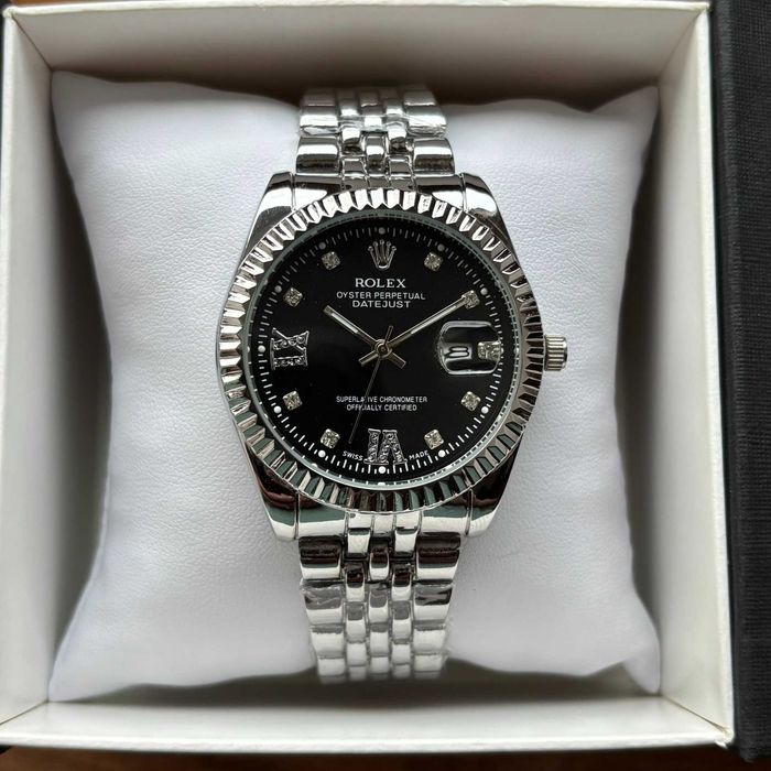 Жіночий годинник Rolex Datajust на браслеті срыбного кольору з датою