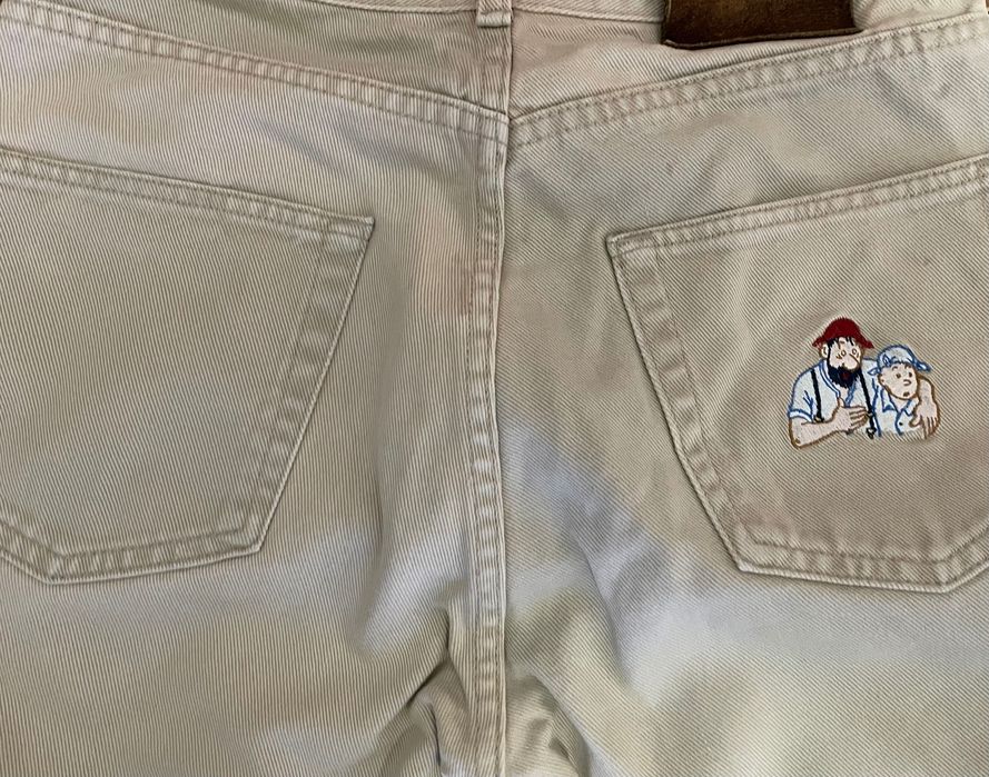 Calças jeans roupa de homem Armani Jeans e Tintim e Milou Aventura