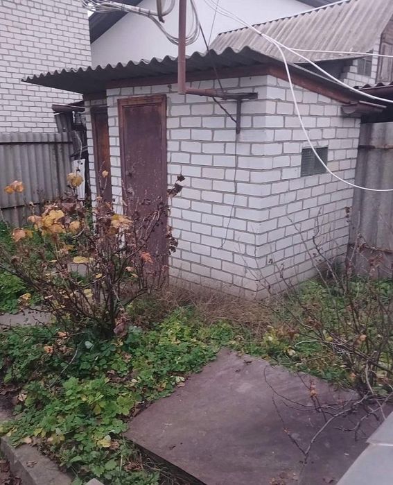 Частина будинку з гаражем на Павлівці