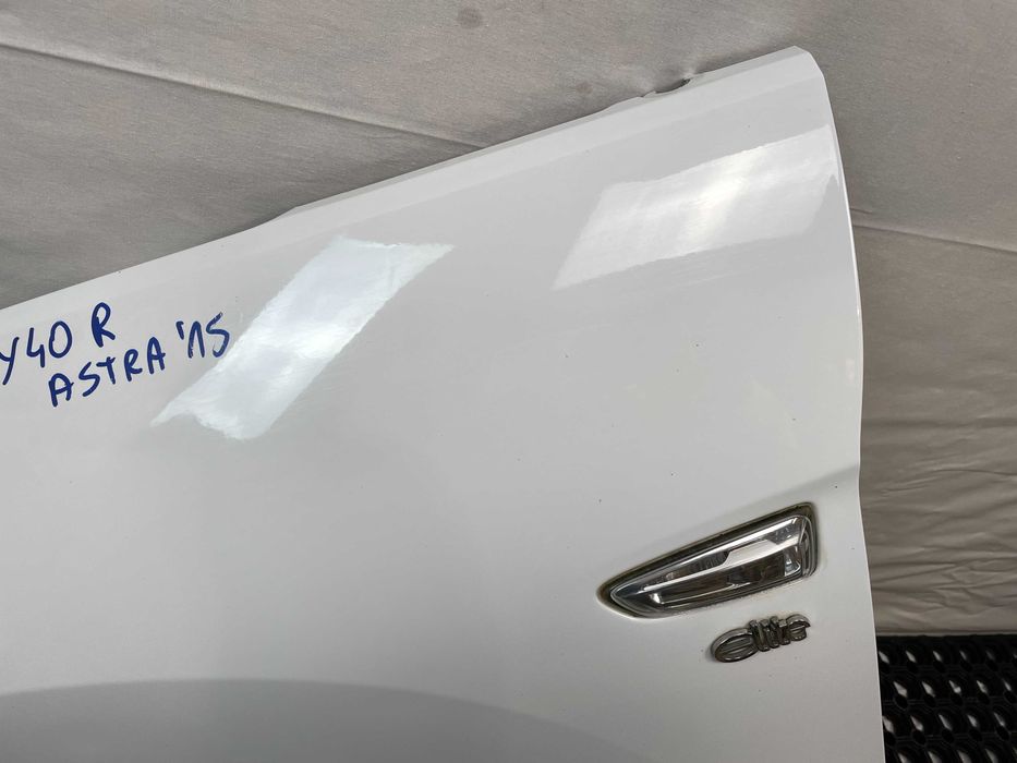 Błotnik przód przedni lewy opel astra v k kod lakieru: y40r 2015-