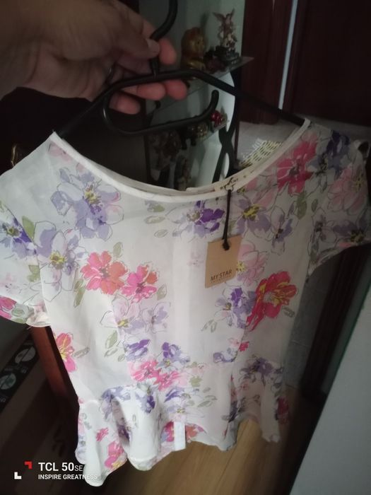Vendo lotes de roupa semi nova 50 peças 30€