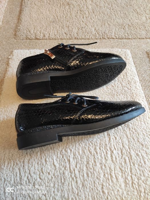 Туфельки на дівчинку