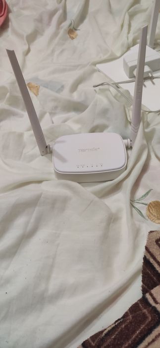 Poутер Tenda 301