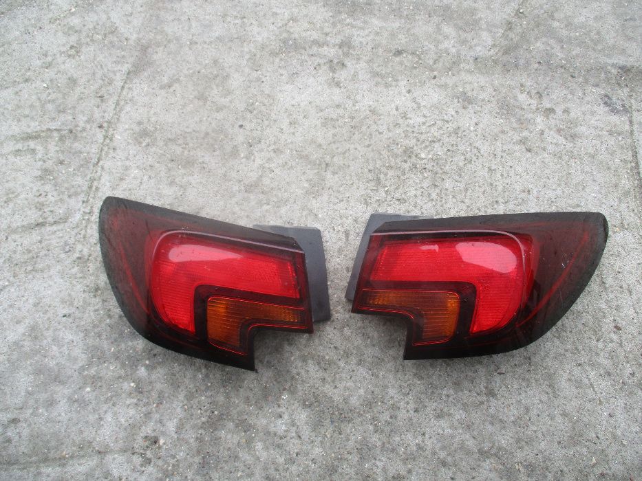 Opel Astra V K lampa lewa prawa tył tylna komplet