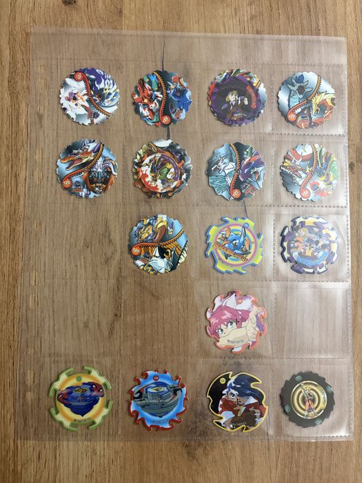 Beyblade spinner tazos 125/172