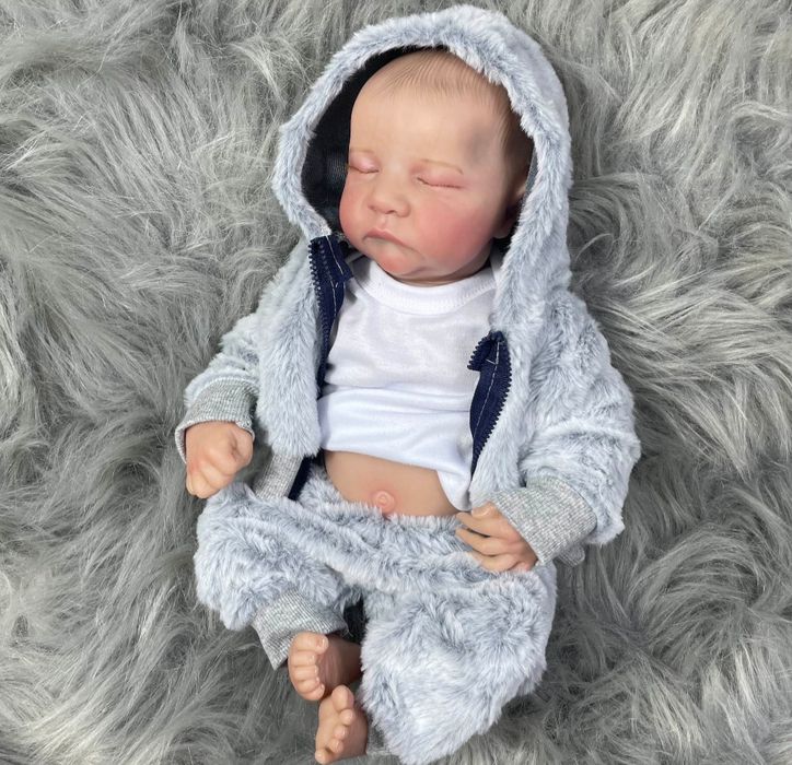 Nowa lalka z winylu śpiący chłopiec typ Reborn