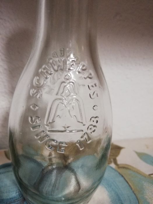 Bolsa pele/garrafa Schweppes