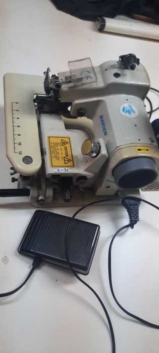 Máquina de bainhas invisíveis