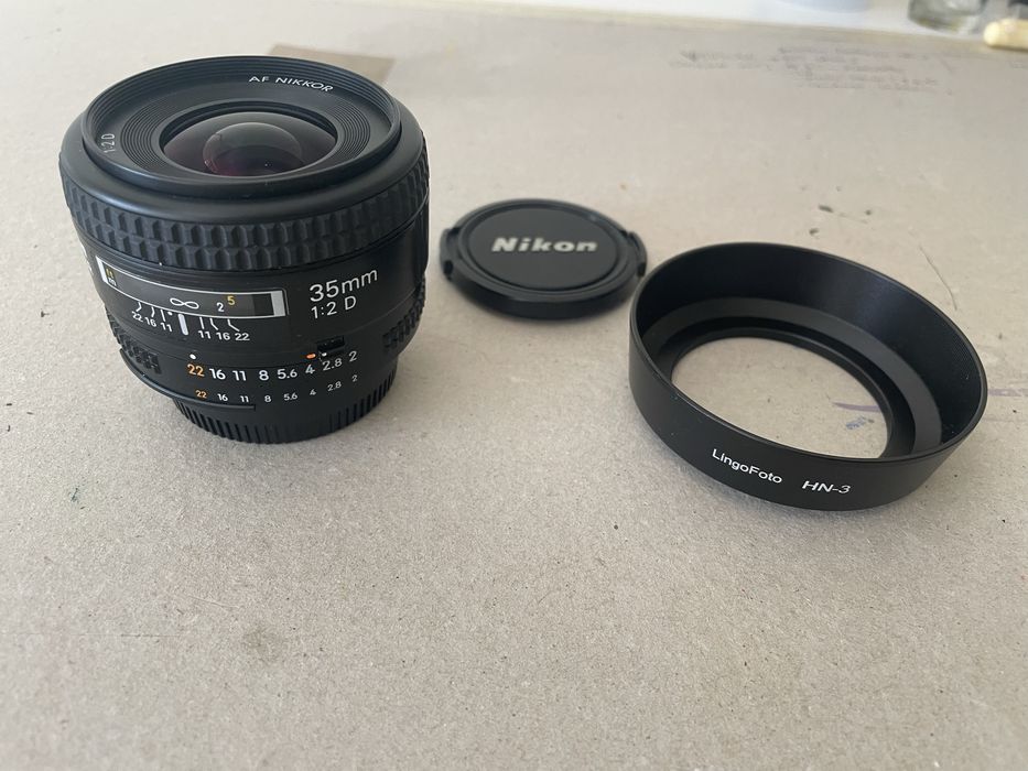 Nikon 35mm f2d + tampas e parasol