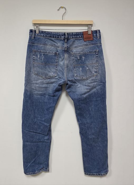 Zara damskie jeansy z dziurami 42 XL zwężane