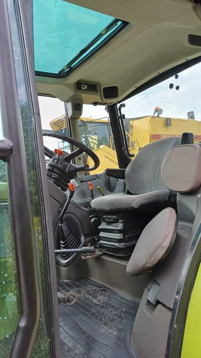Claas Axos 320 z ładowaczem czołowym Faucheux Captor 100