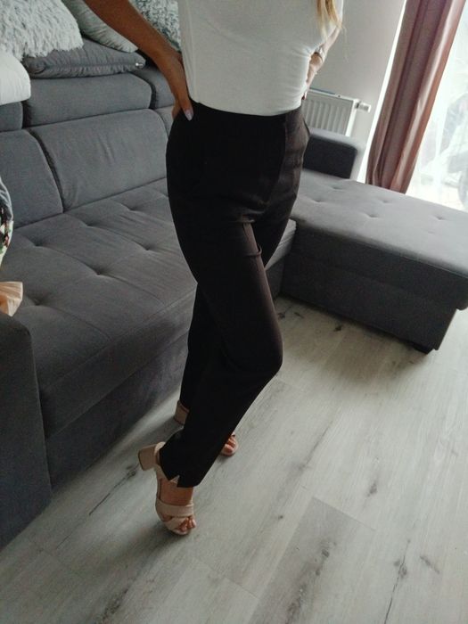 Eleganckie czarne spodnie w kant S