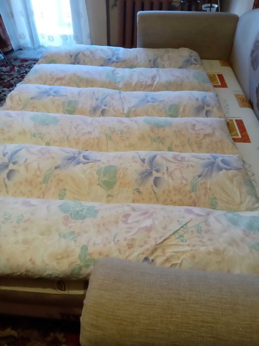 Перина пухова нова.